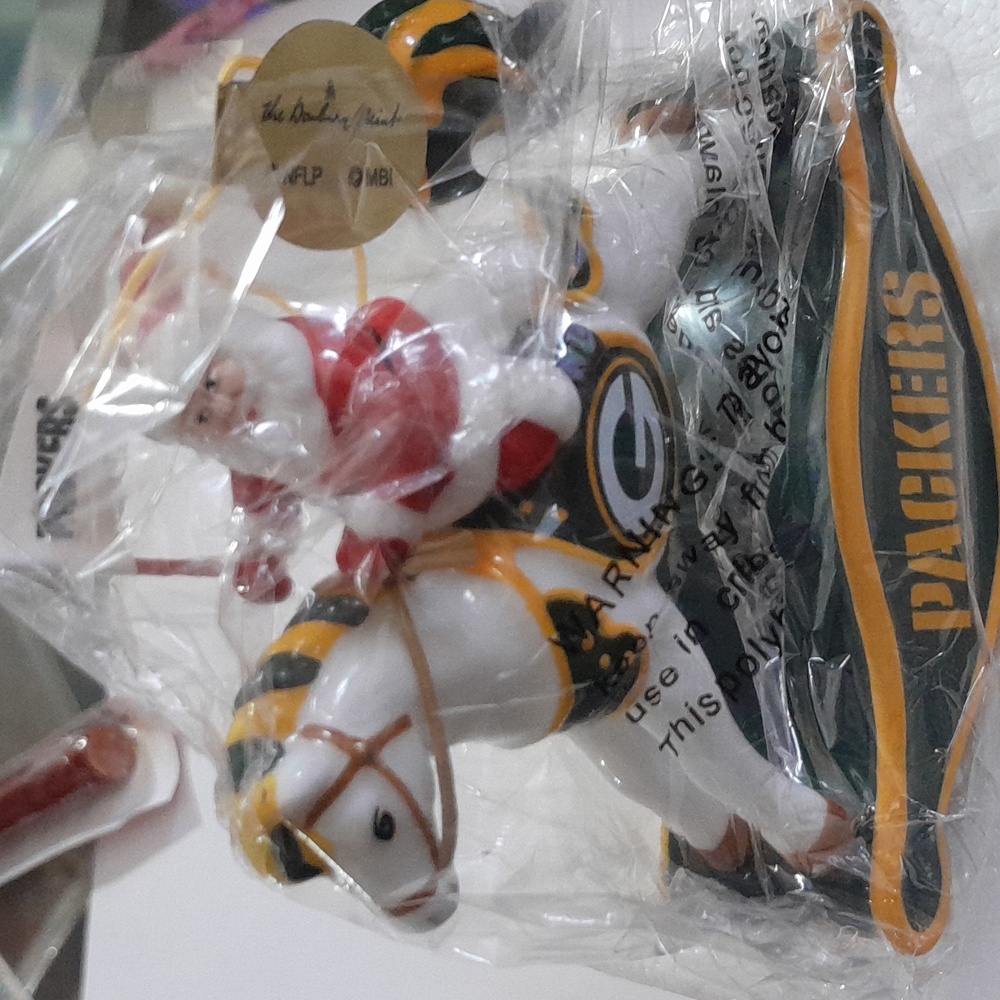 Greenbay Packers Christmas Ornament Santa on Rocking Horse